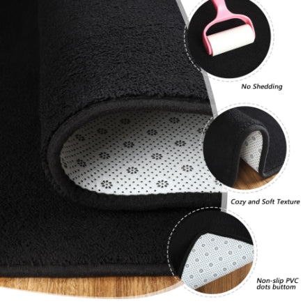 Contemporary black living room rug under sofa
