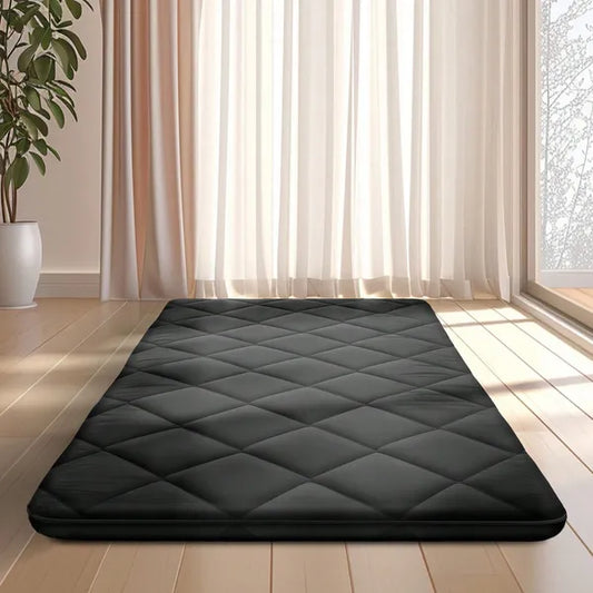 Japanese foldable floor mattress in modern minimalist bedroom