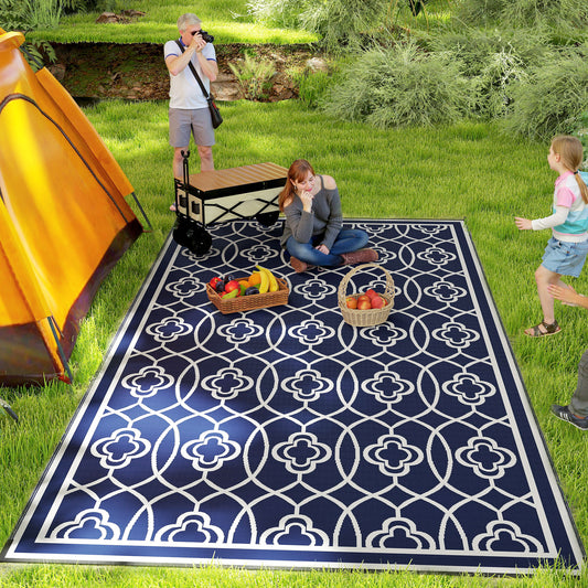 Reversible waterproof outdoor rug used for camping